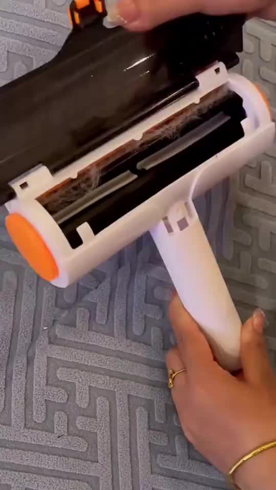 Open collection chamber of the white-and-orange roller